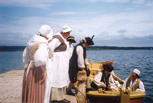 Militia men head to sea.