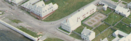 Bigot House and Storehouse with its attached garden © Parks Canada