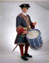 Kevin O'Shea is dressed as a drummer of the Compagnie Franche de la Marine: Parks Canada, Fortress of Louisbourg, 95R0812S.JPG